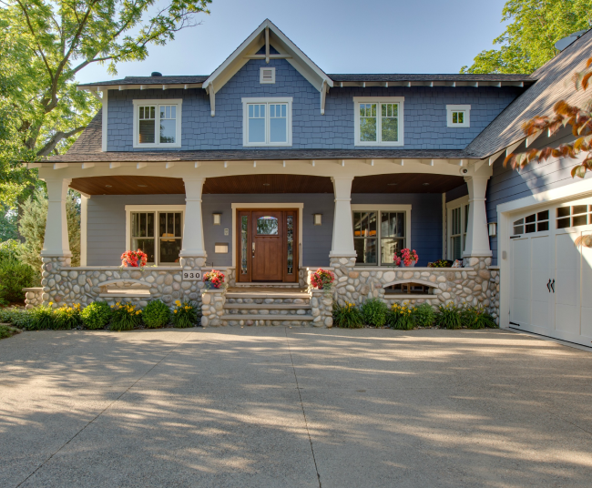 Home exterior with front porch and driveway