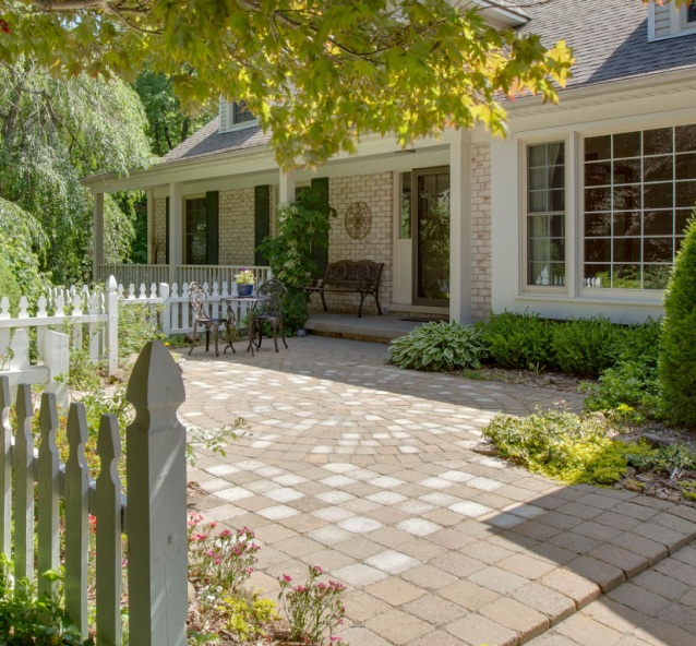Front patio and picket fence at a home