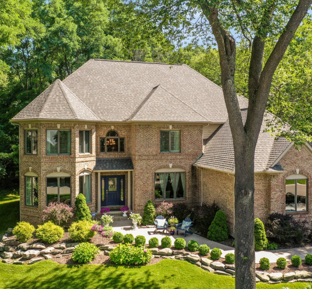 Brick home exterior with landscaping