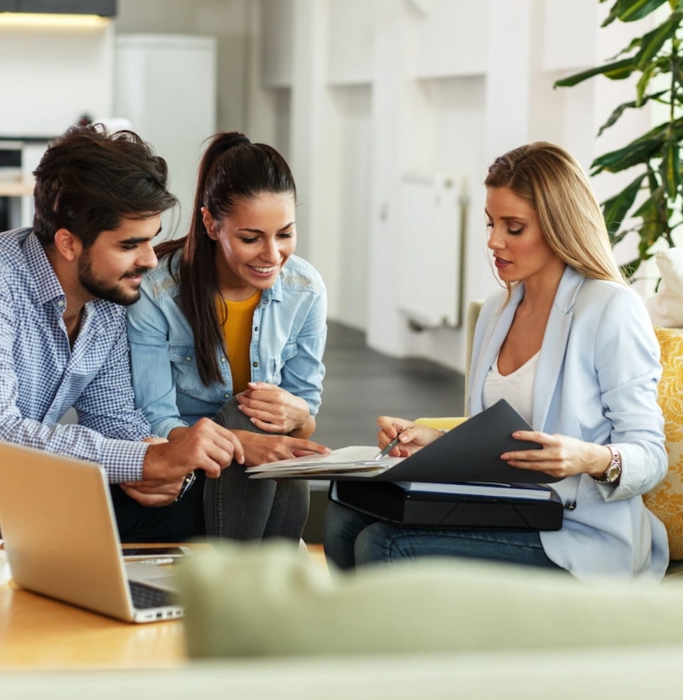 Couple reviewing home buying paperwork