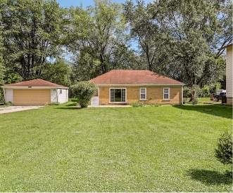 ranch house with plain yard